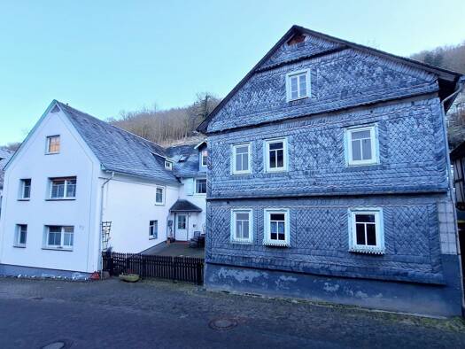 Mehrfamilienhaus zum Kauf 129.000 € 10 Zimmer 144 m² 1.065 m² Grundstück frei ab sofort Oberdiebach Manubach 55413