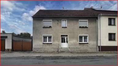 Reihenmittelhaus zum Kauf 40.000 € 7 Zimmer 160 m² 403 m² Grundstück frei ab 01.10.2025 Schlieben Schlieben 04936