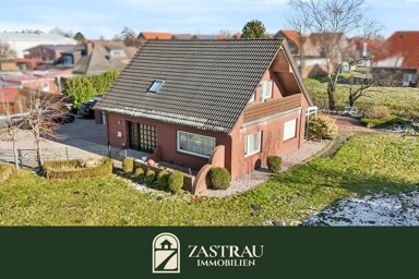 Einfamilienhaus zum Kauf 339.000 € 6 Zimmer 210 m² 1.370 m² Grundstück Moordorf Südbrookmerland 26624