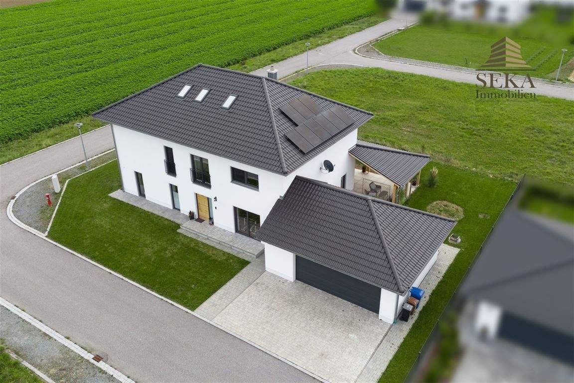 Zeitlos elegantes Einfamilienhaus mit Panoramablick und Garten - Effizienzhaus 40 Plus