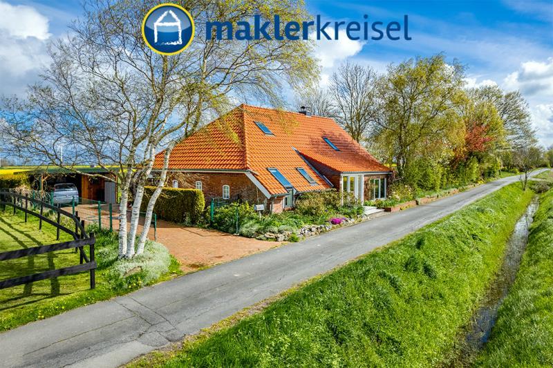 Einfamilienhaus zum Kauf 399.000 € 10 Zimmer 182 m²<br/>Wohnfläche 2.026 m²<br/>Grundstück Berdum Wittmund OT Carolinensiel 26409