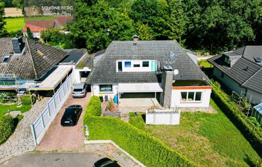 Einfamilienhaus zum Kauf 499.000 € 6 Zimmer 243 m² 956 m² Grundstück Harksheider Straße  25 Wilstedt Tangstedt 22889