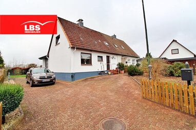Doppelhaushälfte zum Kauf 270.000 € 4 Zimmer 100 m² 588 m² Grundstück Bad Bramstedt 24576