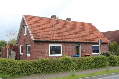 Haus zum Kauf 120.000 € 3 Zimmer 100 m² 597 m² Grundstück Burhafe Wittmund 26409