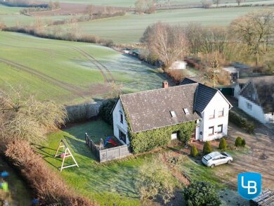 Mehrfamilienhaus zum Kauf 299.000 € 6 Zimmer 190,9 m² 1.416 m² Grundstück Hutzfeld Hutzfeld 23715