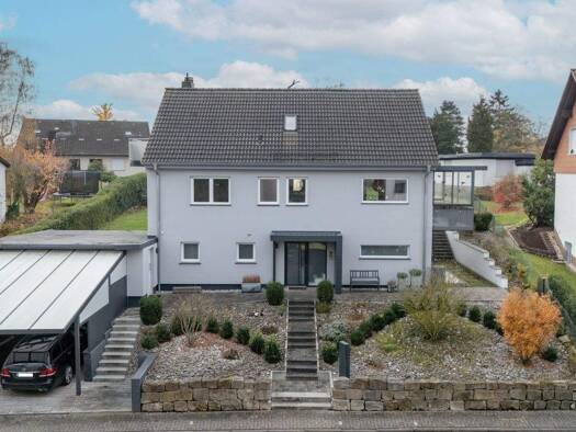 Einfamilienhaus zum Kauf 749.000 € 8 Zimmer 240 m² 1.077 m² Grundstück Annerod Fernwald 35463