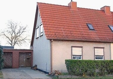 Doppelhaushälfte zum Kauf 56.000 € 4 Zimmer 83 m² 1.121 m² Grundstück Gartenheim 55 Helbra 06311