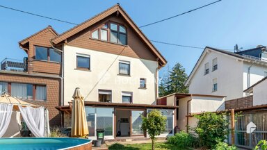 Mehrfamilienhaus zum Kauf 628.000 € 9 Zimmer 200 m² 570 m² Grundstück Delkenheim - Mitte Wiesbaden 65205