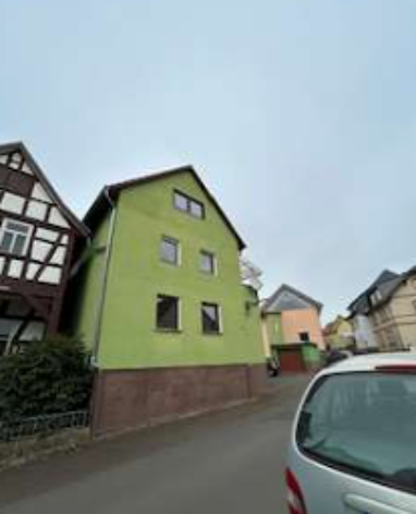 Haus zum Kauf 310.000 € 10 Zimmer 320 m² 900 m² Grundstück Albach Fernwald 35463