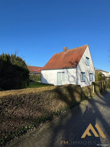 Einfamilienhaus zum Kauf 215.000 € 4 Zimmer 90 m² 452 m² Grundstück Carolinensiel Wittmund / Carolinensiel 26409