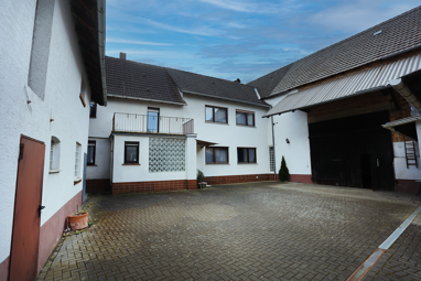Einfamilienhaus zum Kauf 350.000 € 6 Zimmer 175 m² 702 m² Grundstück Ockstadt Friedberg (Hessen) 61169